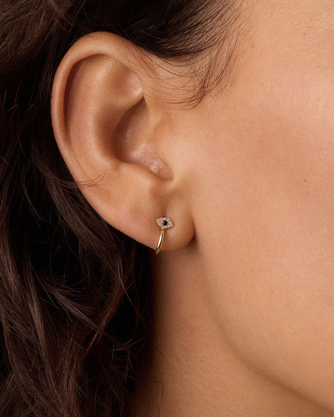 Alternative view of Diamond and Blue Sapphire Evil Eye Stud Huggies